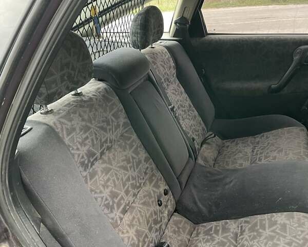 Фіолетовий Опель Вектра, об'ємом двигуна 1.6 л та пробігом 380 тис. км за 1500 $, фото 10 на Automoto.ua