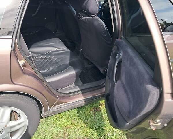 Коричневый Опель Вектра, объемом двигателя 1.8 л и пробегом 456 тыс. км за 2550 $, фото 7 на Automoto.ua