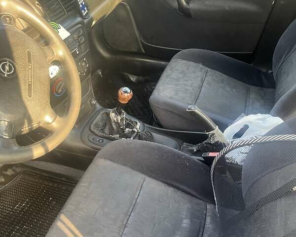 Коричневый Опель Вектра, объемом двигателя 1.8 л и пробегом 225 тыс. км за 1999 $, фото 5 на Automoto.ua