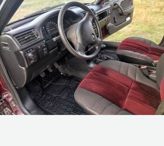 Червоний Опель Вектра, об'ємом двигуна 2 л та пробігом 323 тис. км за 1707 $, фото 6 на Automoto.ua