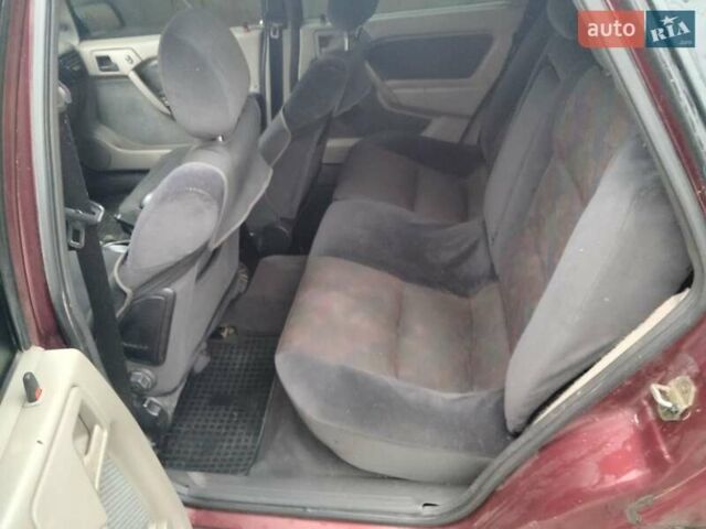 Червоний Опель Вектра, об'ємом двигуна 2 л та пробігом 260 тис. км за 1150 $, фото 12 на Automoto.ua