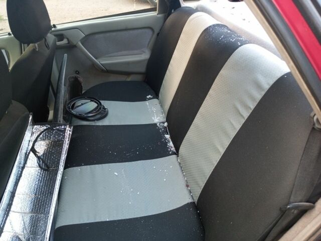 Красный Опель Вектра, объемом двигателя 2 л и пробегом 450 тыс. км за 600 $, фото 6 на Automoto.ua