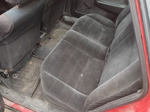 Красный Опель Вектра, объемом двигателя 1 л и пробегом 300 тыс. км за 1300 $, фото 4 на Automoto.ua