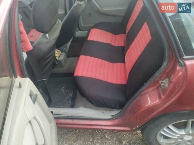 Червоний Опель Вектра, об'ємом двигуна 1.7 л та пробігом 242 тис. км за 1300 $, фото 5 на Automoto.ua