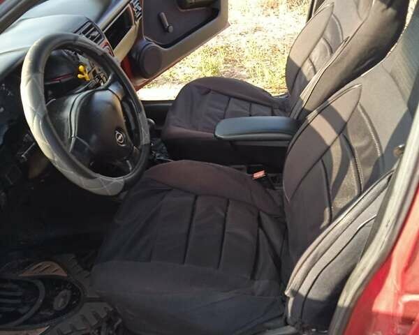 Красный Опель Вектра, объемом двигателя 1.6 л и пробегом 392 тыс. км за 2550 $, фото 14 на Automoto.ua