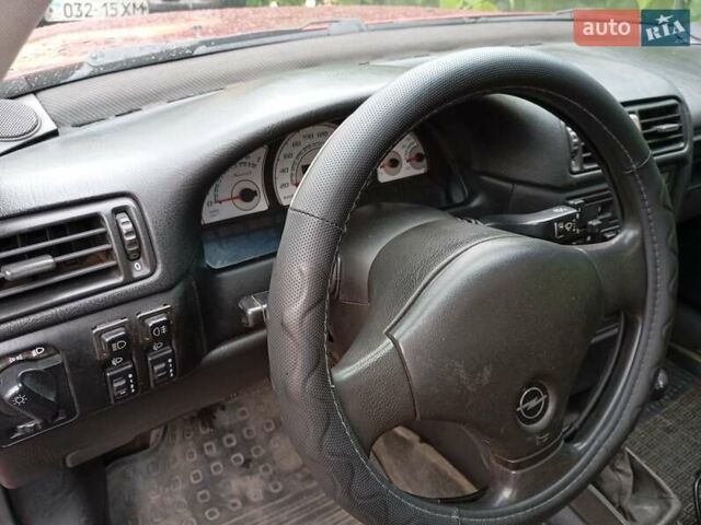 Красный Опель Вектра, объемом двигателя 2.02 л и пробегом 212 тыс. км за 1900 $, фото 21 на Automoto.ua
