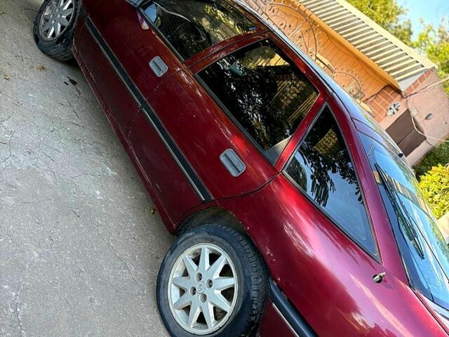 Красный Опель Вектра, объемом двигателя 2 л и пробегом 300 тыс. км за 1250 $, фото 3 на Automoto.ua