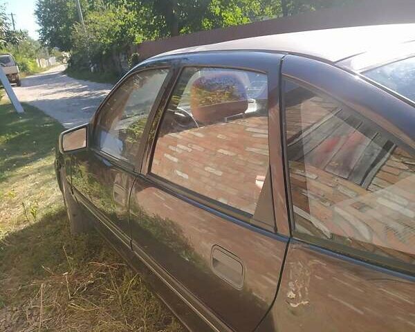 Червоний Опель Вектра, об'ємом двигуна 1.8 л та пробігом 200 тис. км за 966 $, фото 2 на Automoto.ua