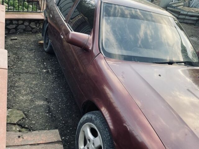 Красный Опель Вектра, объемом двигателя 1.8 л и пробегом 300 тыс. км за 650 $, фото 1 на Automoto.ua