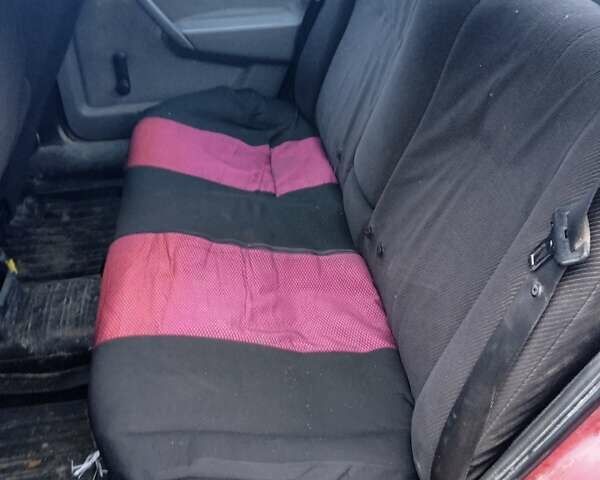 Красный Опель Вектра, объемом двигателя 1.8 л и пробегом 300 тыс. км за 1294 $, фото 6 на Automoto.ua