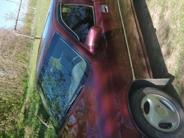 Красный Опель Вектра, объемом двигателя 1.6 л и пробегом 400 тыс. км за 1350 $, фото 6 на Automoto.ua