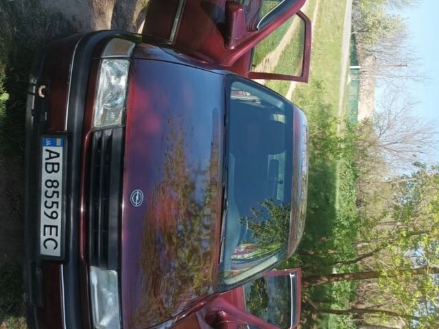 Красный Опель Вектра, объемом двигателя 1.6 л и пробегом 400 тыс. км за 1350 $, фото 2 на Automoto.ua