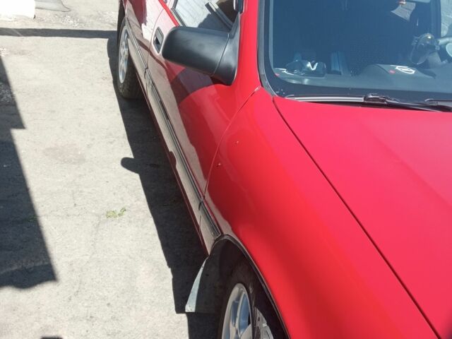 Червоний Опель Вектра, об'ємом двигуна 1 л та пробігом 280 тис. км за 2854 $, фото 1 на Automoto.ua