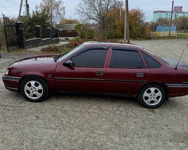 Красный Опель Вектра, объемом двигателя 1.8 л и пробегом 312 тыс. км за 1550 $, фото 2 на Automoto.ua