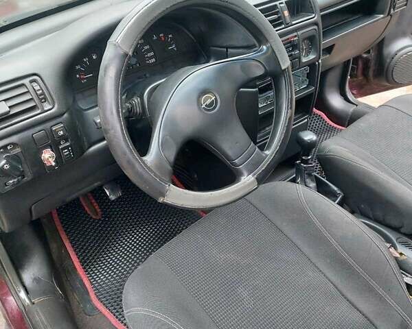 Красный Опель Вектра, объемом двигателя 1.8 л и пробегом 200 тыс. км за 650 $, фото 8 на Automoto.ua