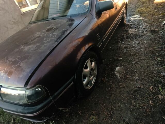 Красный Опель Вектра, объемом двигателя 2 л и пробегом 264 тыс. км за 1000 $, фото 1 на Automoto.ua