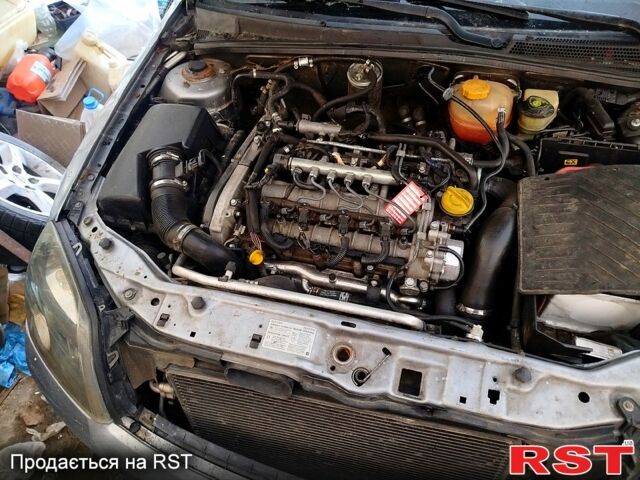 Красный Опель Вектра, объемом двигателя 2 л и пробегом 200 тыс. км за 700 $, фото 1 на Automoto.ua