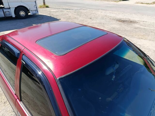 Красный Опель Вектра, объемом двигателя 2 л и пробегом 254 тыс. км за 1450 $, фото 5 на Automoto.ua