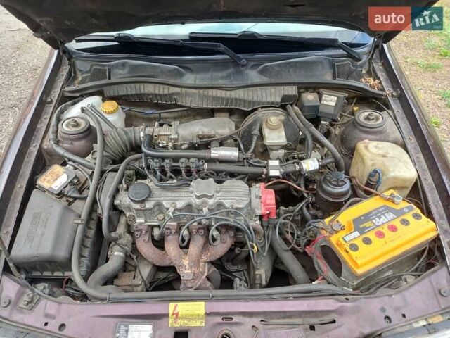 Красный Опель Вектра, объемом двигателя 2 л и пробегом 230 тыс. км за 1400 $, фото 6 на Automoto.ua