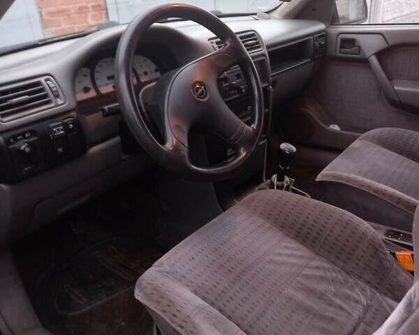 Красный Опель Вектра, объемом двигателя 2 л и пробегом 230 тыс. км за 1400 $, фото 4 на Automoto.ua