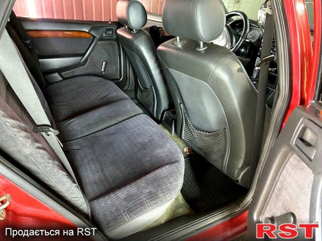 Красный Опель Вектра, объемом двигателя 1.6 л и пробегом 336 тыс. км за 2000 $, фото 3 на Automoto.ua