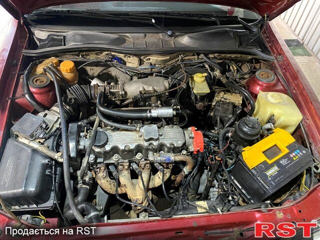 Красный Опель Вектра, объемом двигателя 1.6 л и пробегом 336 тыс. км за 2000 $, фото 2 на Automoto.ua