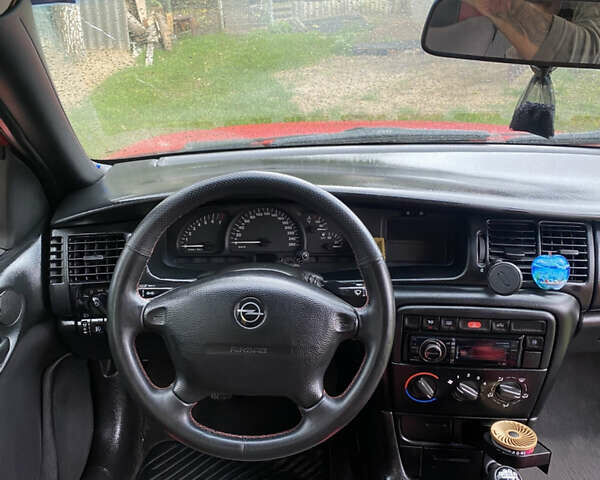 Красный Опель Вектра, объемом двигателя 2 л и пробегом 259 тыс. км за 3200 $, фото 10 на Automoto.ua