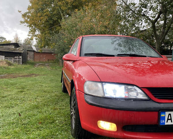 Красный Опель Вектра, объемом двигателя 2 л и пробегом 259 тыс. км за 3200 $, фото 1 на Automoto.ua