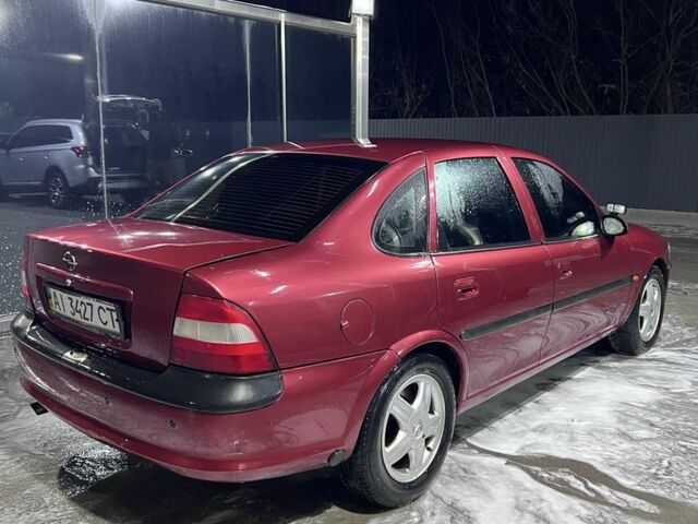 Червоний Опель Вектра, об'ємом двигуна 2 л та пробігом 267 тис. км за 2500 $, фото 5 на Automoto.ua