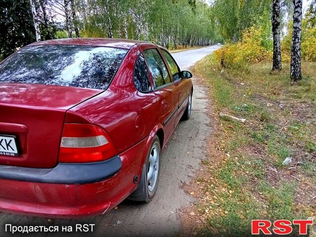 Красный Опель Вектра, объемом двигателя 1.8 л и пробегом 347 тыс. км за 1699 $, фото 3 на Automoto.ua
