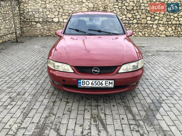 Красный Опель Вектра, объемом двигателя 1.6 л и пробегом 350 тыс. км за 1800 $, фото 1 на Automoto.ua