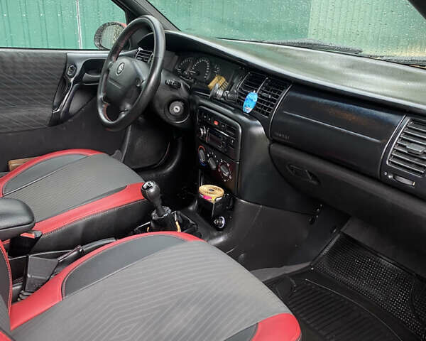 Красный Опель Вектра, объемом двигателя 2 л и пробегом 259 тыс. км за 3200 $, фото 8 на Automoto.ua