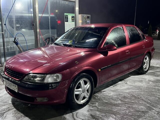 Червоний Опель Вектра, об'ємом двигуна 2 л та пробігом 267 тис. км за 2500 $, фото 2 на Automoto.ua