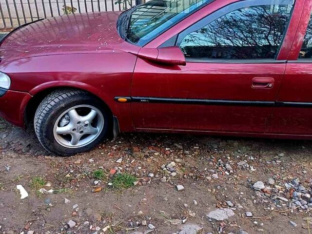 Красный Опель Вектра, объемом двигателя 1.8 л и пробегом 328 тыс. км за 3600 $, фото 1 на Automoto.ua