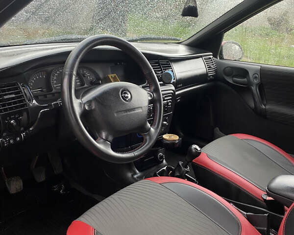 Красный Опель Вектра, объемом двигателя 2 л и пробегом 259 тыс. км за 3200 $, фото 9 на Automoto.ua