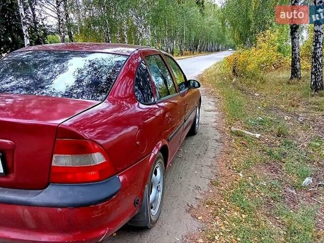 Красный Опель Вектра, объемом двигателя 1.8 л и пробегом 347 тыс. км за 1699 $, фото 2 на Automoto.ua