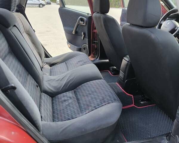 Червоний Опель Вектра, об'ємом двигуна 1.8 л та пробігом 300 тис. км за 1699 $, фото 14 на Automoto.ua