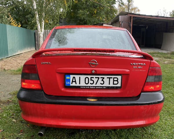 Красный Опель Вектра, объемом двигателя 2 л и пробегом 259 тыс. км за 3200 $, фото 6 на Automoto.ua