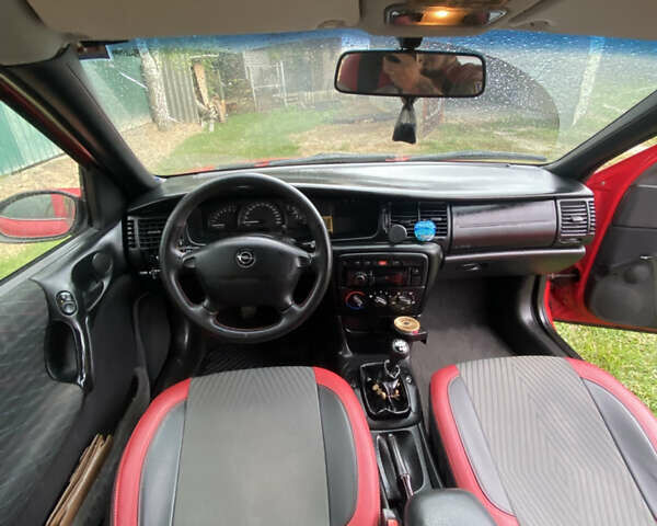 Красный Опель Вектра, объемом двигателя 2 л и пробегом 259 тыс. км за 3200 $, фото 12 на Automoto.ua