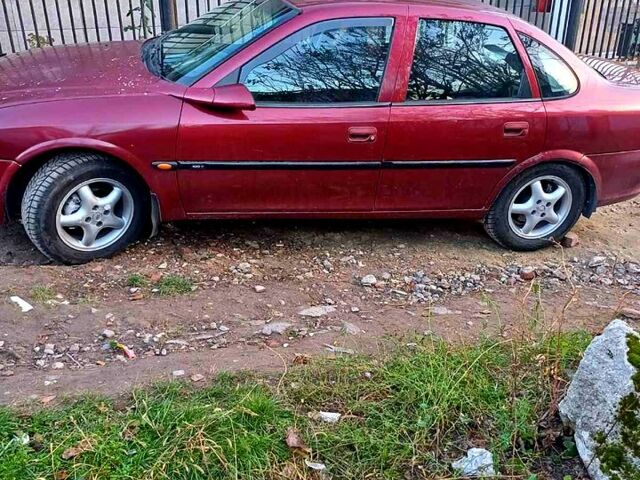 Красный Опель Вектра, объемом двигателя 1.8 л и пробегом 328 тыс. км за 3600 $, фото 9 на Automoto.ua
