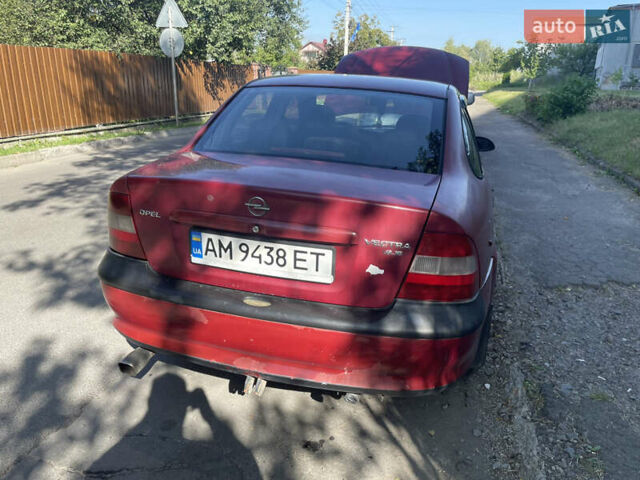Красный Опель Вектра, объемом двигателя 1.6 л и пробегом 335 тыс. км за 1000 $, фото 3 на Automoto.ua
