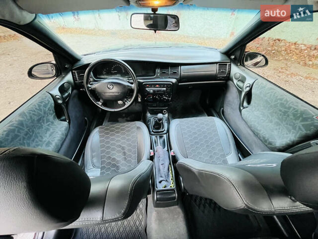 Опель Вектра 1997 в Каменское - Днепродзержинск на Automoto.ua Красный Опель Вектра, объемом двигателя 1.78 л и пробегом 350 тыс. км за 3499 $, фото 34 на Automoto.ua