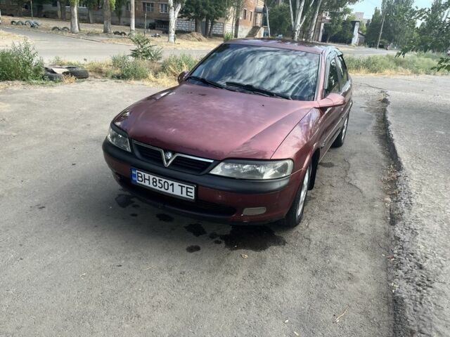 Червоний Опель Вектра, об'ємом двигуна 2.5 л та пробігом 416 тис. км за 2700 $, фото 3 на Automoto.ua
