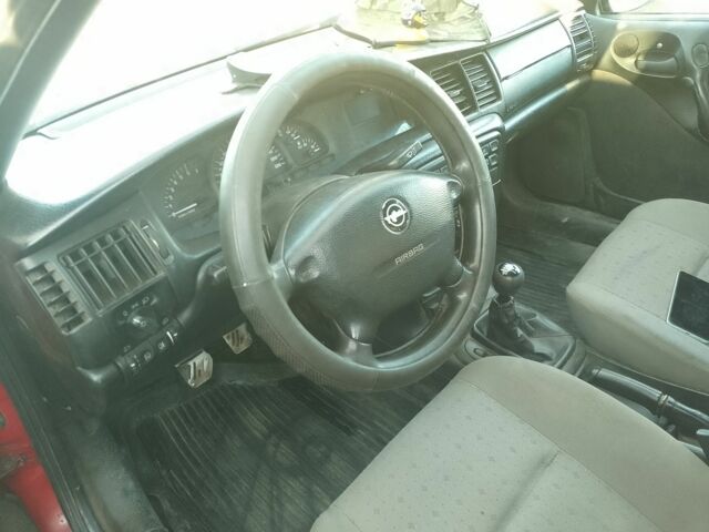 Червоний Опель Вектра, об'ємом двигуна 1.6 л та пробігом 216 тис. км за 2000 $, фото 5 на Automoto.ua