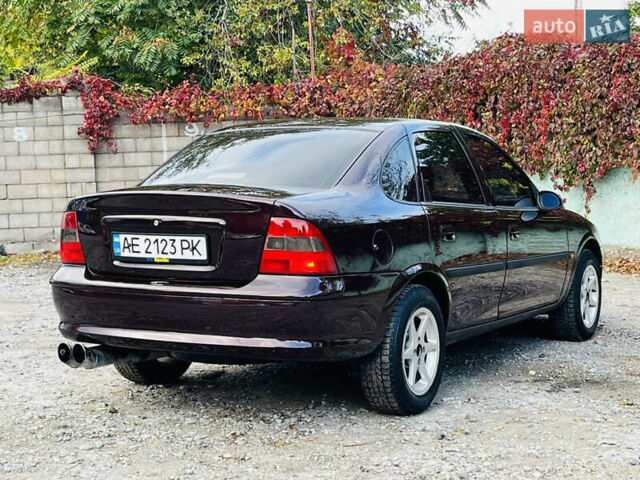 Опель Вектра 1997 в Каменское - Днепродзержинск на Automoto.ua Красный Опель Вектра, объемом двигателя 1.78 л и пробегом 350 тыс. км за 3499 $, фото 16 на Automoto.ua