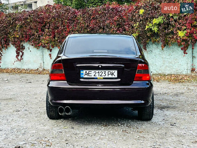 Опель Вектра 1997 в Каменское - Днепродзержинск на Automoto.ua Красный Опель Вектра, объемом двигателя 1.78 л и пробегом 350 тыс. км за 3499 $, фото 15 на Automoto.ua