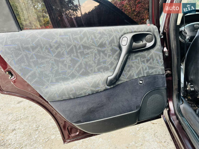 Опель Вектра 1997 в Каменское - Днепродзержинск на Automoto.ua Красный Опель Вектра, объемом двигателя 1.78 л и пробегом 350 тыс. км за 3499 $, фото 30 на Automoto.ua