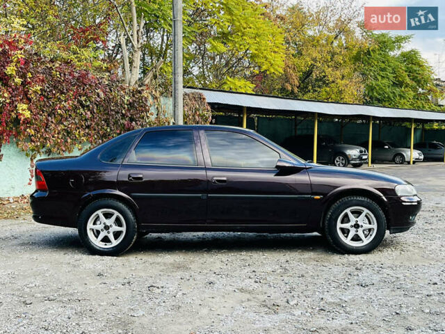 Опель Вектра 1997 в Каменское - Днепродзержинск на Automoto.ua Красный Опель Вектра, объемом двигателя 1.78 л и пробегом 350 тыс. км за 3499 $, фото 5 на Automoto.ua