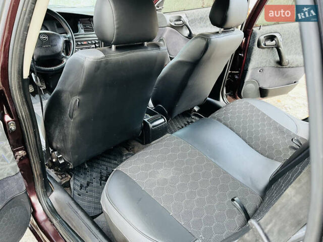 Опель Вектра 1997 в Каменское - Днепродзержинск на Automoto.ua Красный Опель Вектра, объемом двигателя 1.78 л и пробегом 350 тыс. км за 3499 $, фото 27 на Automoto.ua