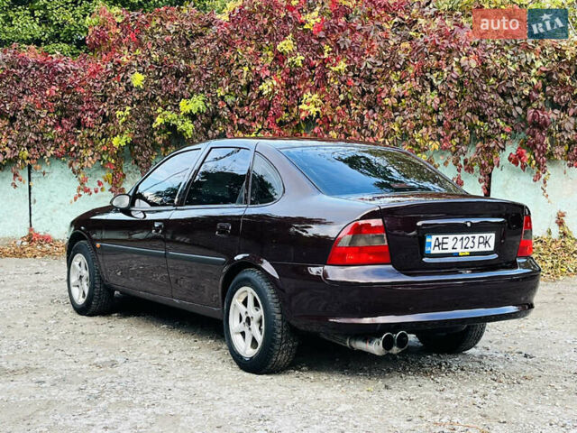 Опель Вектра 1997 в Каменское - Днепродзержинск на Automoto.ua Красный Опель Вектра, объемом двигателя 1.78 л и пробегом 350 тыс. км за 3499 $, фото 13 на Automoto.ua